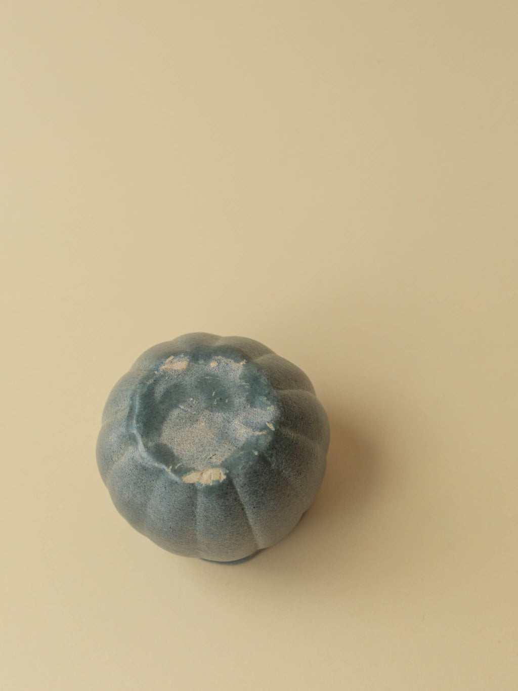 A small grey Kupittaan Savi vintage of the bottom. Scandinavian design from Finland.