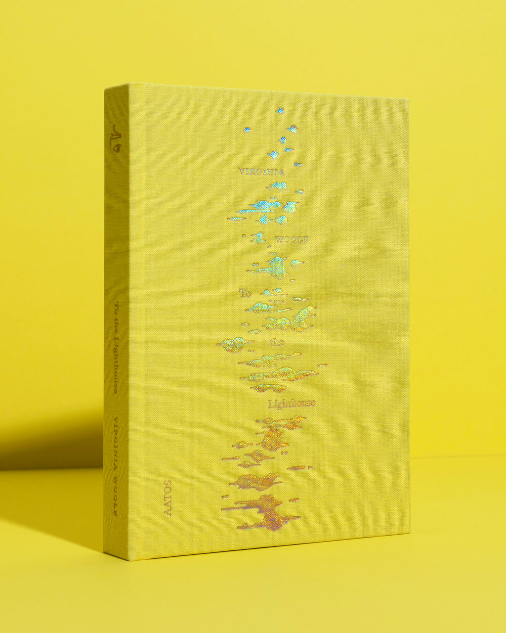 Virginia Woolf's To the Lighthouse book published by Aatos Editions. The book is standing showing front cover on yellow background.
